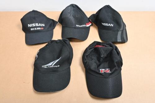 NISSAN: A group of five Nissan caps. 'GTR', 'NISSAN NISMO TEXAS 400 TOUR 2013', 'NISSAN NISMO' caps
