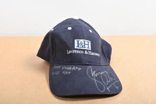 RICHARDS: A L&H Lawrence & Hanson dark blue cap, visor signed by Steve Richards