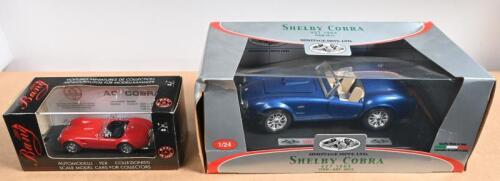 AC COBRA: Two AC Shelby Cobra diecast models. 1:43 scale Bang AC COBRA "STRADALE RAGGI" in red (410) & 1:24 scale Heritage Mint, LTD (Bburago) 'SHELBY COBRA 427 (1965) in blue