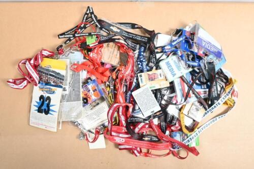 INDYCAR: A quantity of IndyCar lanyards and track passes from various IndyCar related events