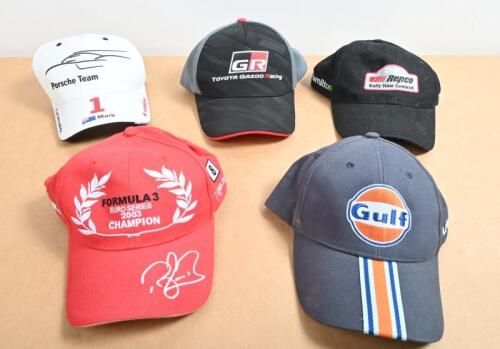 CAPS: An assortment of car racing caps. 'Gulf - LE MANS', 'Porsche Team', '2008 REPCO Rally New Zealand', 'TOYOTA GAZOO Racing'