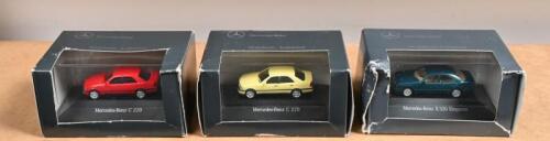 MERCEDES-BENZ: Three 1:87 scale Mercedes-Benz - Modellauto-Kollektion Press Conference models from 1993 and 1995. Mercedes-Benz C 220 in red
