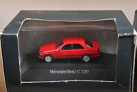 MERCEDES-BENZ: Three 1:87 scale Mercedes-Benz - Modellauto-Kollektion Press Conference models from 1993 and 1995. Mercedes-Benz C 220 in red - 2