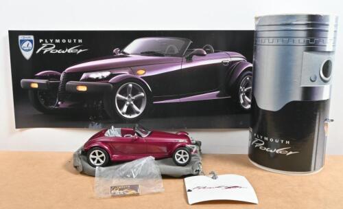 PROWLER: A Plymouth Prowler promotional cylinder tube. Tube with Prowler model & sales brochure