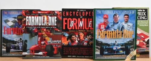 FORMULA 1 DATA: A group of hardcover books detailing Formula 1 history and statistics