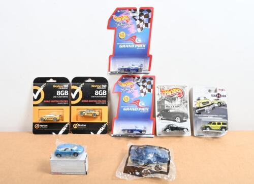 RACING/ROAD: A collection of 1:64 scale diecast road and racing cars. Two Hot Wheels 2000 QANTAS AUSTRALIAN GRAND PRIX Formula 1 models, Limited Editions of 10,000
