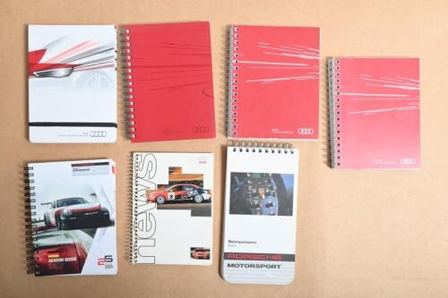 AUDI/PORSCHE: A group of seven Audi and Porsche season guide and blank notepads