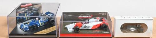 FORMULA 1/INDY: Three Formula 1 and IndyCar related items. Quartzo Tyrrell P34 as raced by Jody Scheckter (4028) to victory at the 1976 Swedish Grand Prix