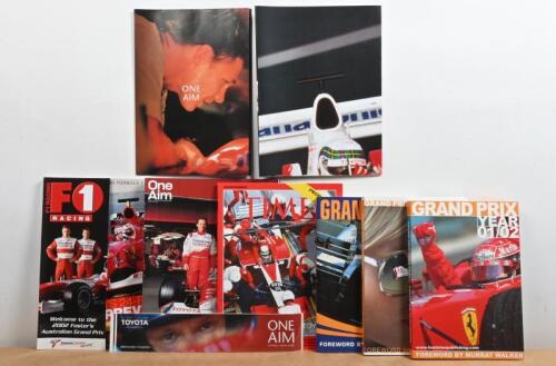 FORMULA 1: A collection of items related to Formula 1. Toyota F1 'ONE AIM' publications and posters & Grand Prix Year Books