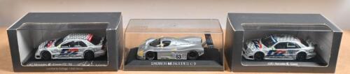 MERCEDES-BENZ: Three 1:43 scale Mercedes-Benz racing models. Two Mercedes-Benz Modellauto-Kollektion AMG Mercedes C-Klasse models