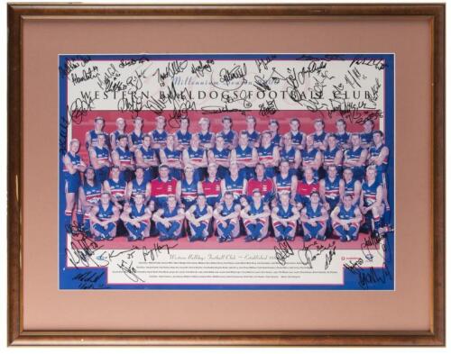 WESTERN BULLDOGS: A framed board mounted Western Bulldogs 2000 team poster, autographed, with COA from The Bulldog Shop. Not glazed