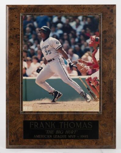 FRANK THOMAS: A framed official photograph of Frank Thomas, photograph behind perspex mounted onto board