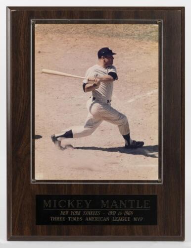 MICKY MANTLE: A framed official photograph of Micky Mantle, photograph behind perspex mounted onto board