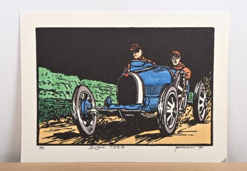 T35B: A hand coloured wood block print by Peter McGann depicting a Bugatti T35B in a state of race. Numbered lower left edition '2' of 5
