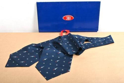 BUGATTI: A cravat with insignia of Ettore Bugatti and the elephant emblem from the radiator cap of a Bugatti Royale