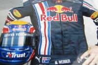 MARK WEBBER: Three large photographs of Webber in his Red Bull racing car, (3 Webber signatures) - 3