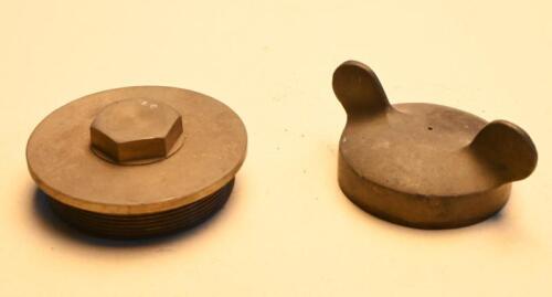 CAPS: A group of brass caps including a winged fuel cap and a sump plug