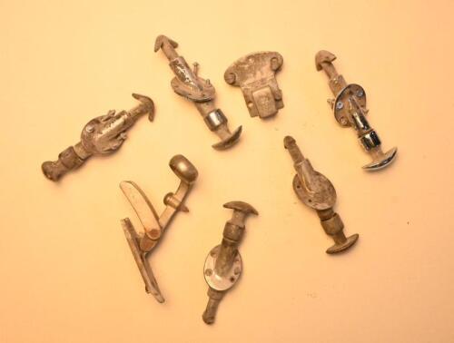 BODY CATCHES: Five body catches, 4 front, 1 rear