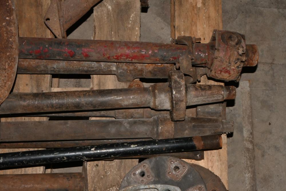 2 trapezoids req repairs, rear diff housing, 1 drive shaft, 2 rear ...