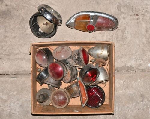 BRAKE LAMPS: A box of various lamps, mainly rear red lensed.