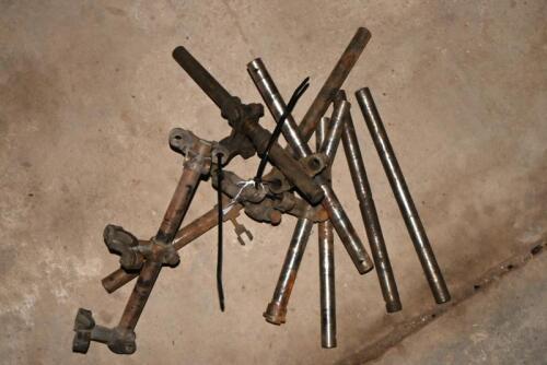 ROCKER ASSEMBLY SHAFTS: A collection of nine Lambda rocker assembly shafts