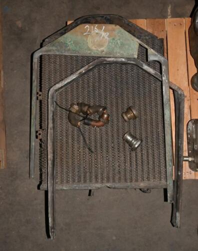 RADIATOR: A Lambda radiator core and two copper surrounds with assorted fittings