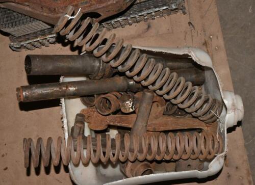 FRONT END COMPONENTS: Sliding pillar front end components, including stub axles, springs, unknown completeness