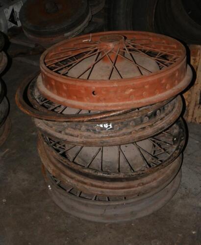 WHEELS: Four wire wheels with hubs and one locking ring