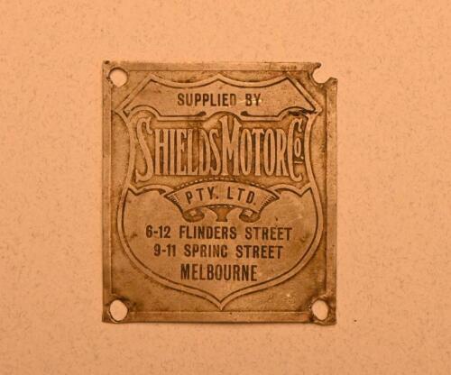 BADGE: Shields Motors brass dash badge