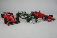 IRVINE: Three 1:18 scale model F1 cars as raced by Eddie Irvine