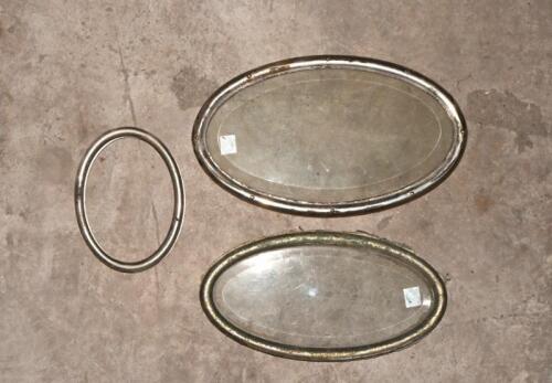 WINDOWS: Three oval window frames, two with glass