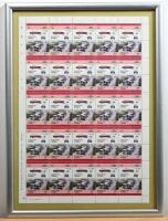STAMPS: A framed page of fifty 60c stamps featuring a 1925 Lancia Lambda, 37 x 27cm overall