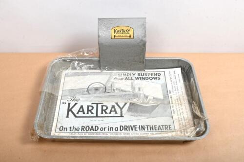 KARTRAY: A circa 1950s galvanised tin "Kartray", with attachment to suspend the tray from the car window, with original plastic wrap, 29cm wide, 20cm deep