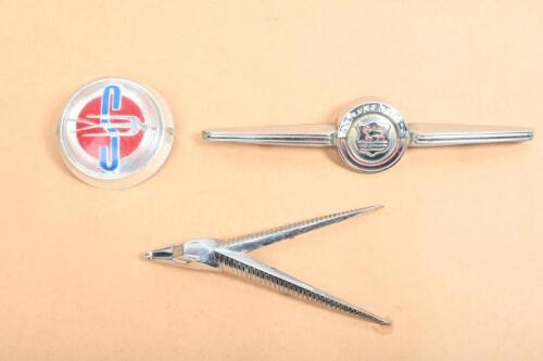 BADGES: A collection of assorted emblems and a mascot, comprising Morris, Simca and Singer Gazelle