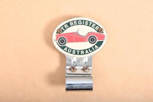 TRIUMPH: A Triumph TR Register Australia badge with mounting bracket