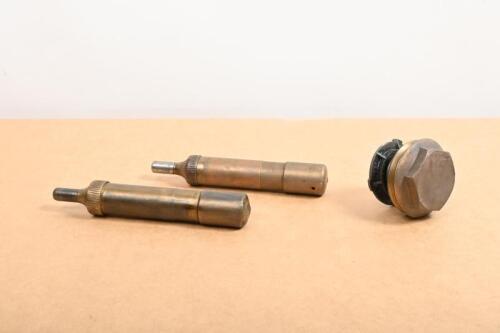 RADIATOR CAP: An early brass radiator cap with spring&Acirc;&nbsp;mechanism, together with two early brass grease guns