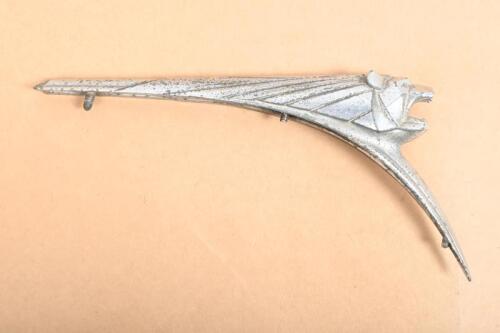 PEUGEOT: A chrome hood ornament mascot for a Peugeot 203