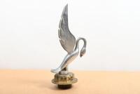 SWAN: A large swan figure mounted onto a brass radiator cap