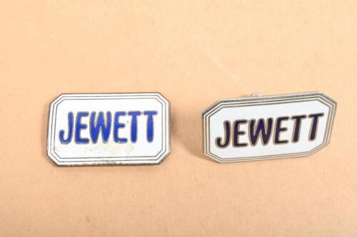 JEWETT: Two enameled white and blue Jewett badges