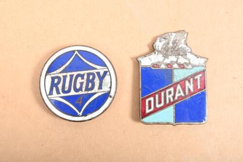 DURANT MOTORS: Two enameled badges including a Durant Motors badge and a Rugby 4 badge