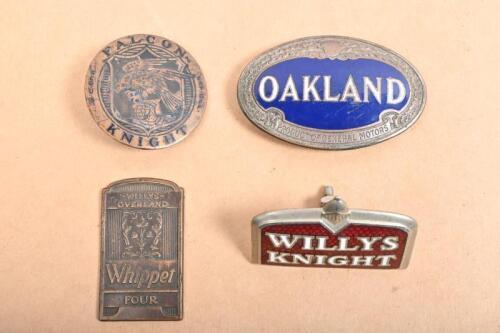 WILLYS/ OAKLAND/KNIGHT: Four badges including a enameled Oakland badge, a Willys Knight badge&nbsp;a Willys Overland 'Whippet Four' badge and a Falcon Knight badge