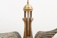 MOTOMETER: A decorative mascot combination including dog bone with wings, surmounted by a brass lighthouse thermometer - 2