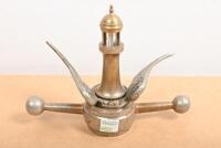 MOTOMETER: A decorative mascot combination including dog bone with wings, surmounted by a brass lighthouse thermometer - 3