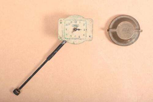 FORD: Two early Ford items including a unusual Circa 1930s Ford 'Ashtray' clock along with a brass Ford gas cap