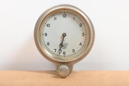 SMITHS: A early English Smith's front wind car clock for dash