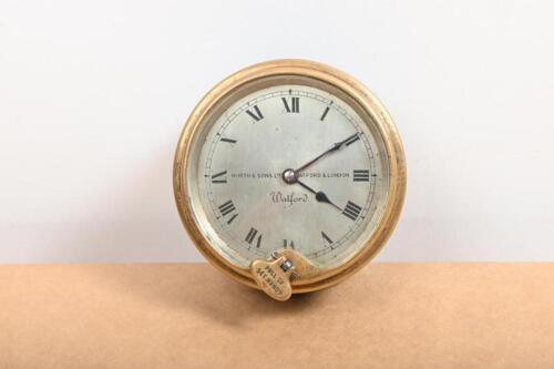 WATFORD: A early brass Watford '7516' clock made by North & Sons Watford in London