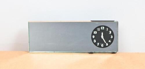 CLOCK: A 8 days car clock mounted into a rear view mirror
