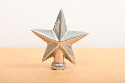ORNAMENT: A Star shaped hood ornament for bonnet 7.5cm wide, 7.5cm high