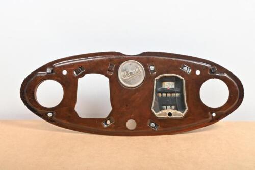 OLDSMOBILE: A 1924 Oldsmobile 'Six' model 30 dashboard panel with speedometer and centred Oldsmobile badge