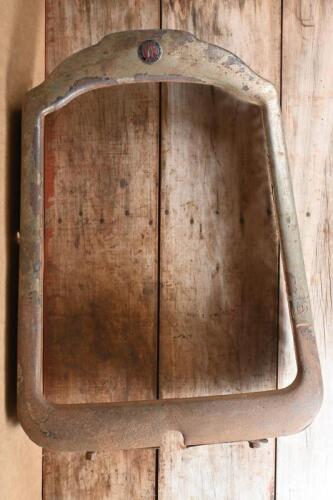 WILLYS: A 1926-1929 Willys Knight front radiator surround with enameled front&nbsp;badge&nbsp;